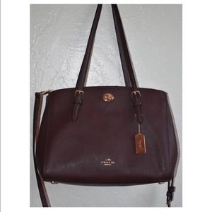 Oxblood coach bag